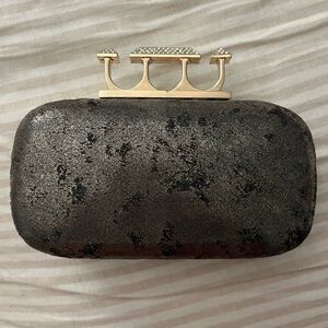 Metallic silver and gold hard shell evening clutch